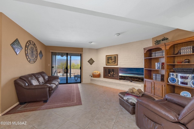 571 N Tanque Verde Loop Rd, Tucson, AZ 85748 - living area with light tile patterned floors and a brick fireplace