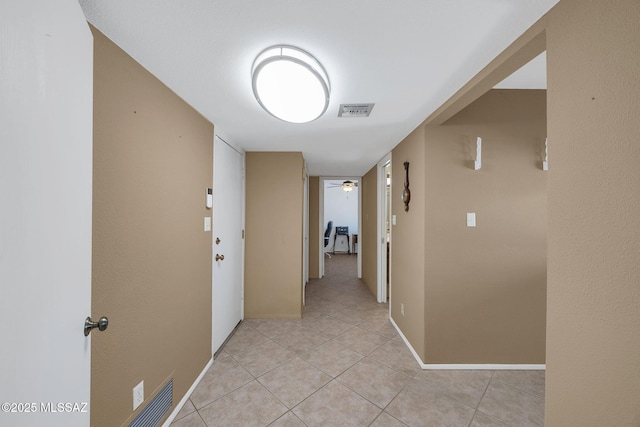 571 N Tanque Verde Loop Rd, Tucson, AZ 85748 - corridor with light tile patterned floors and baseboards