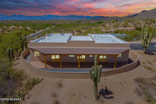 12101 E Thunderhead Ranch Rd, Tucson, AZ 85747 - back of house with a mountain view and a patio