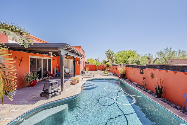 241 W Calle Mccleary, Green Valley, AZ 85614 - view of swimming pool with a fenced backyard, a ceiling fan, and a patio area