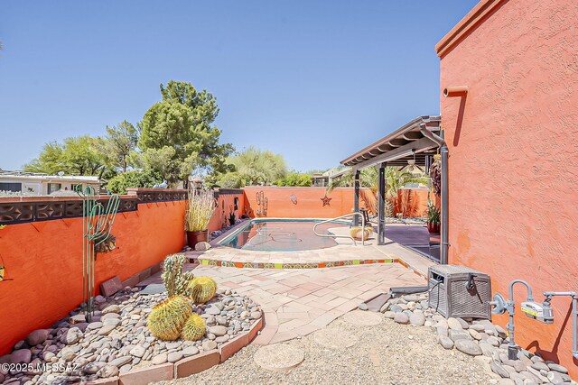 241 W Calle Mccleary, Green Valley, AZ 85614 - view of patio featuring a fenced backyard