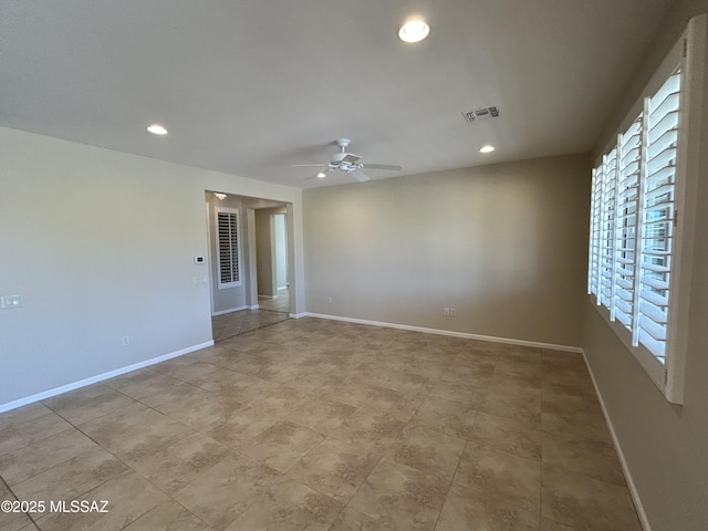 60422 E Arroyo Vista Dr, Oracle, AZ 85623 - empty room with ceiling fan, baseboards, and recessed lighting