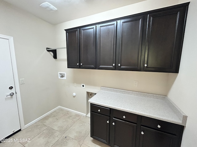 60422 E Arroyo Vista Dr, Oracle, AZ 85623 - laundry area featuring cabinet space, electric dryer hookup, hookup for a washing machine, baseboards, and hookup for a gas dryer