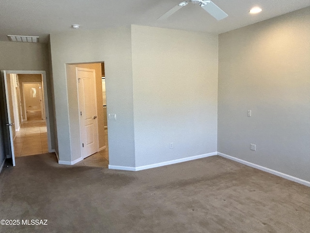 60422 E Arroyo Vista Dr, Oracle, AZ 85623 - spare room featuring carpet, a ceiling fan, baseboards, and recessed lighting