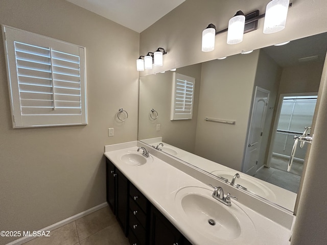 60422 E Arroyo Vista Dr, Oracle, AZ 85623 - bathroom with baseboards, tile patterned floors, and double vanity