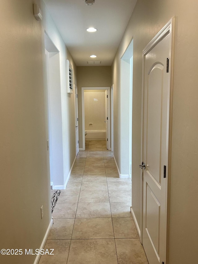 60422 E Arroyo Vista Dr, Oracle, AZ 85623 - corridor with light tile patterned floors, baseboards, and recessed lighting