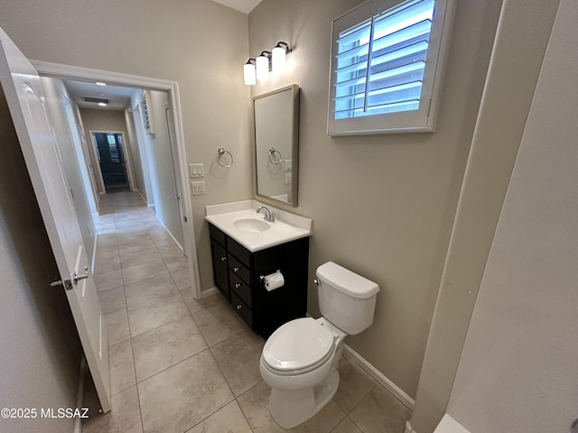 60422 E Arroyo Vista Dr, Oracle, AZ 85623 - bathroom featuring toilet, tile patterned flooring, vanity, and baseboards