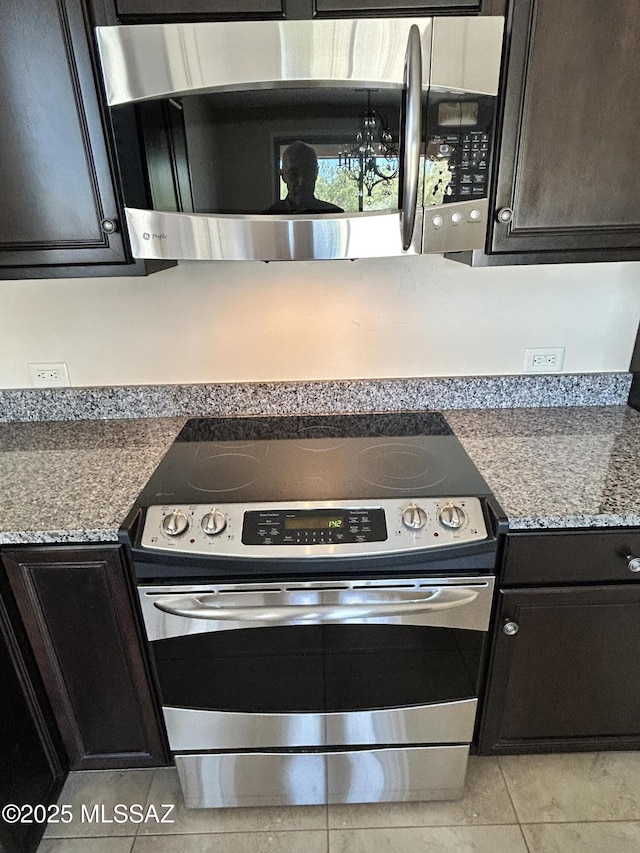 60422 E Arroyo Vista Dr, Oracle, AZ 85623 - kitchen featuring appliances with stainless steel finishes and light tile patterned floors