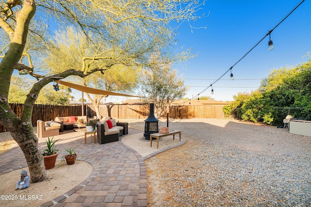 2120 N Fair Oaks Ave, Tucson, AZ 85712 - fenced backyard with an outdoor living space and a patio
