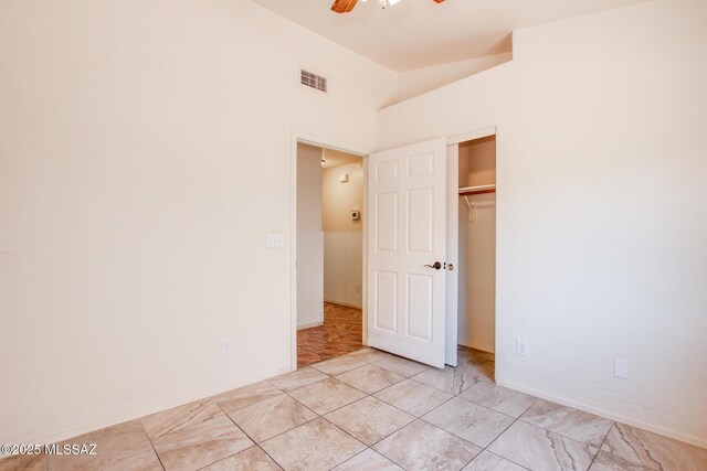 8145 E Smooth Sumac Ln, Tucson, AZ 85710 - unfurnished bedroom with a closet and a ceiling fan
