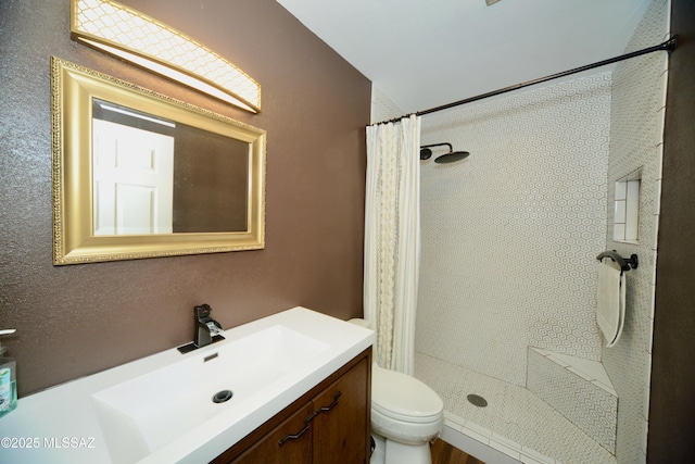 980 W Camino Sagasta, Green Valley, AZ 85622 - full bathroom featuring a shower stall, vanity, and toilet