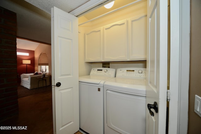 980 W Camino Sagasta, Green Valley, AZ 85622 - washroom with cabinet space, washing machine and clothes dryer, and a textured ceiling