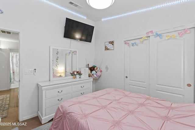 519 W Silvertip Rd, Tucson, AZ 85737 - bedroom with a closet and baseboards