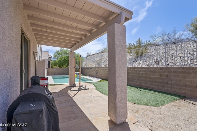 519 W Silvertip Rd, Tucson, AZ 85737 - fenced backyard featuring a patio