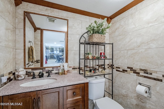 333 Valley View Dr, Rio Rico, AZ 85648 - bathroom with tile walls, toilet, and vanity