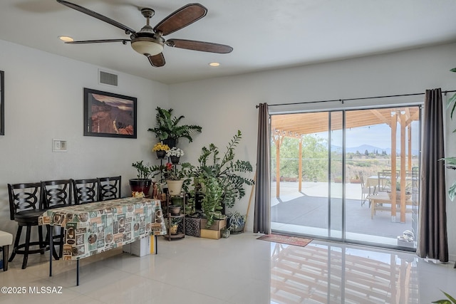 333 Valley View Dr, Rio Rico, AZ 85648 - sitting room featuring tile patterned floors, ceiling fan, a mountain view, and recessed lighting