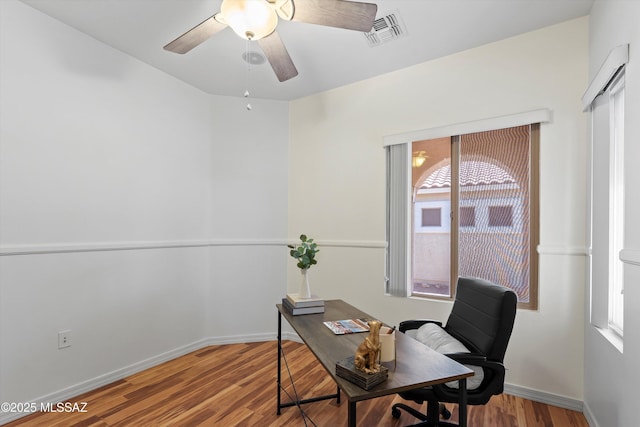 472 W Calle Sedillo, Sahuarita, AZ 85629 - home office featuring wood finished floors, ceiling fan, and baseboards