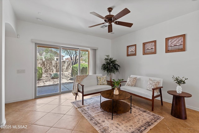 472 W Calle Sedillo, Sahuarita, AZ 85629 - living room with a ceiling fan, light tile patterned flooring, and baseboards
