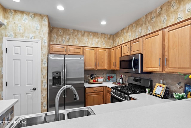 472 W Calle Sedillo, Sahuarita, AZ 85629 - kitchen with stainless steel appliances, a sink, light countertops, decorative backsplash, and recessed lighting