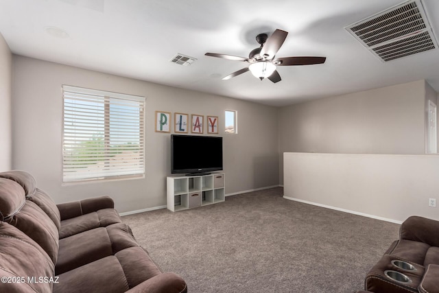 21185 E Reunion Rd, Red Rock, AZ 85145 - carpeted living room featuring a ceiling fan and baseboards