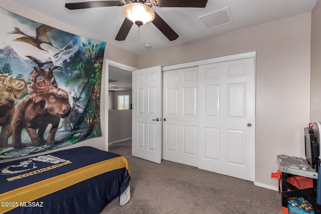 21185 E Reunion Rd, Red Rock, AZ 85145 - carpeted bedroom featuring a ceiling fan, a closet, and baseboards