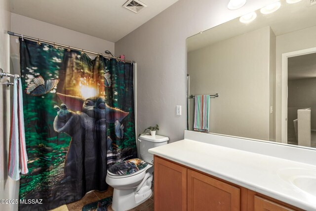 21185 E Reunion Rd, Red Rock, AZ 85145 - full bathroom with vanity, toilet, tile patterned flooring, and curtained shower
