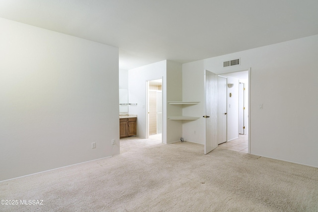 5790 E Chiricahua Trl, Tucson, AZ 85750 - spare room featuring light carpet