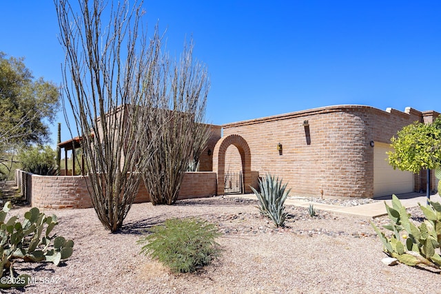 5790 E Chiricahua Trl, Tucson, AZ 85750 - view of front of property with an attached garage