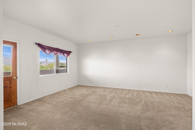 12220 E 5th St, Tucson, AZ 85748 - carpeted spare room featuring recessed lighting