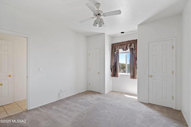 12220 E 5th St, Tucson, AZ 85748 - unfurnished bedroom with carpet and ceiling fan