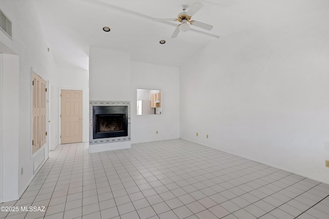 12220 E 5th St, Tucson, AZ 85748 - unfurnished living room with a fireplace, light tile patterned flooring, ceiling fan, and high vaulted ceiling