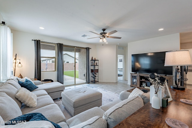 11267 S Weismann Dr, Vail, AZ 85641 - living area with ceiling fan, recessed lighting, and baseboards