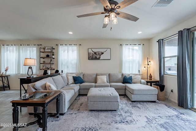 11267 S Weismann Dr, Vail, AZ 85641 - living room with healthy amount of natural light, ceiling fan, recessed lighting, and baseboards