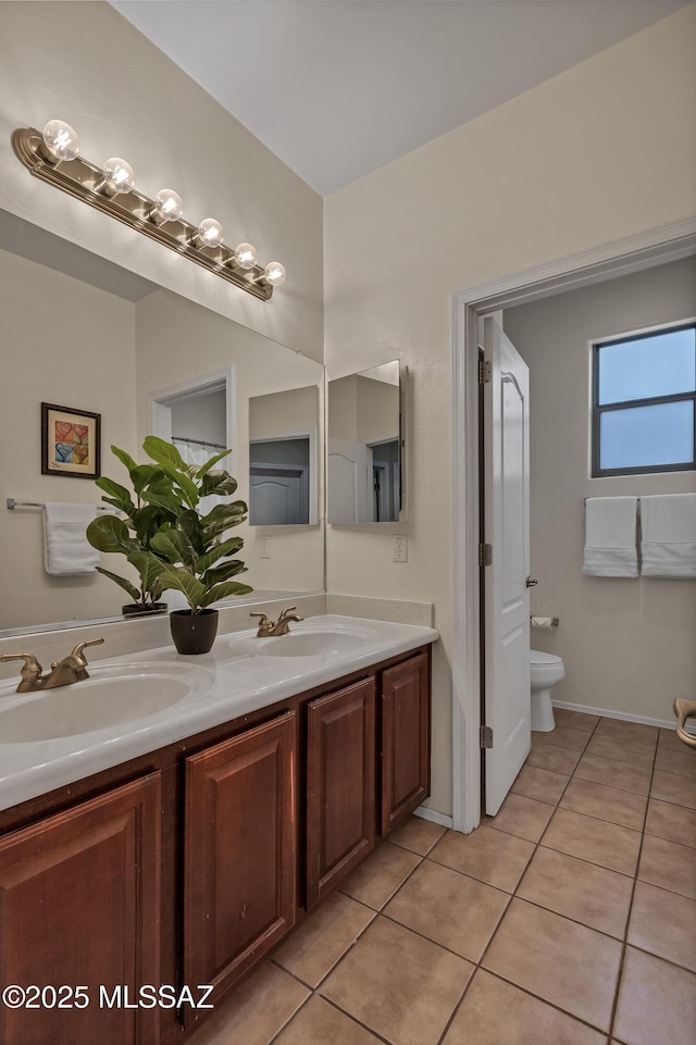 10676 S Miramar Canyon Pass, Vail, AZ 85641 - bathroom with tile patterned flooring, toilet, and double vanity