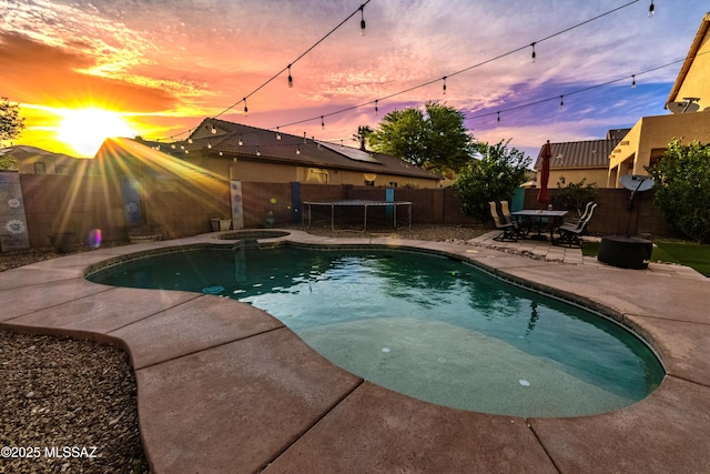 10676 S Miramar Canyon Pass, Vail, AZ 85641 - view of swimming pool featuring a patio, a fenced backyard, and a pool with connected hot tub