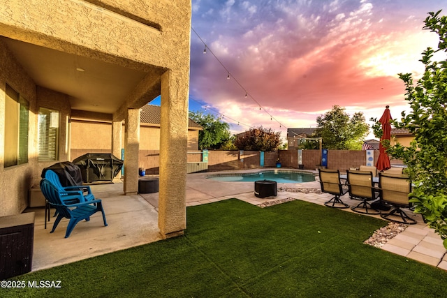 10676 S Miramar Canyon Pass, Vail, AZ 85641 - view of swimming pool with a patio, a storage shed, and an outbuilding