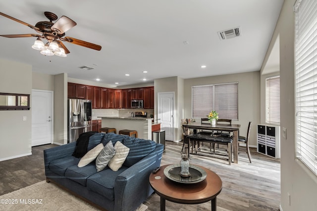 10676 S Miramar Canyon Pass, Vail, AZ 85641 - living area featuring ceiling fan, light wood finished floors, recessed lighting, and baseboards