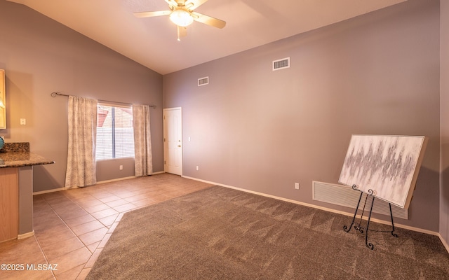 9664 E Paseo, San Rosendo, Tucson, AZ 85747 - empty room featuring high vaulted ceiling, a ceiling fan, light tile patterned floors, and baseboards