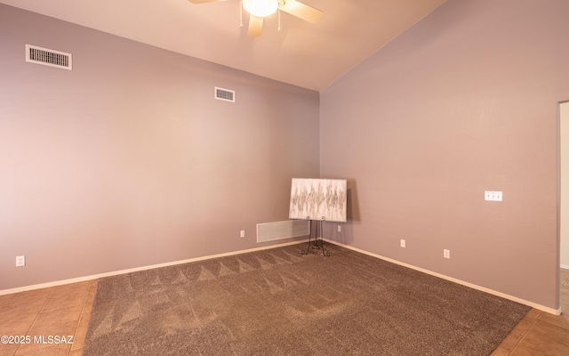 9664 E Paseo, San Rosendo, Tucson, AZ 85747 - empty room with ceiling fan, baseboards, tile patterned floors, and high vaulted ceiling