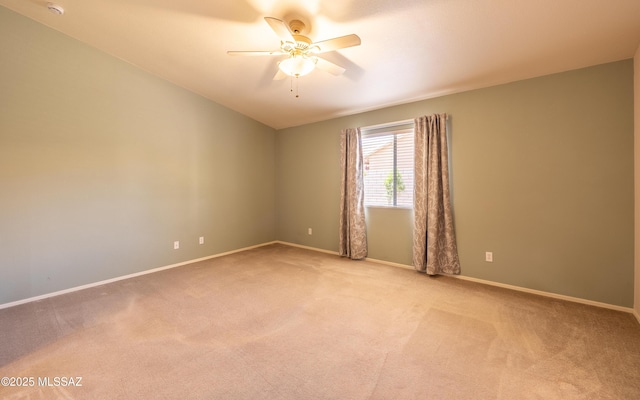 9664 E Paseo, San Rosendo, Tucson, AZ 85747 - carpeted spare room with ceiling fan, baseboards, vaulted ceiling, and a smoke detector