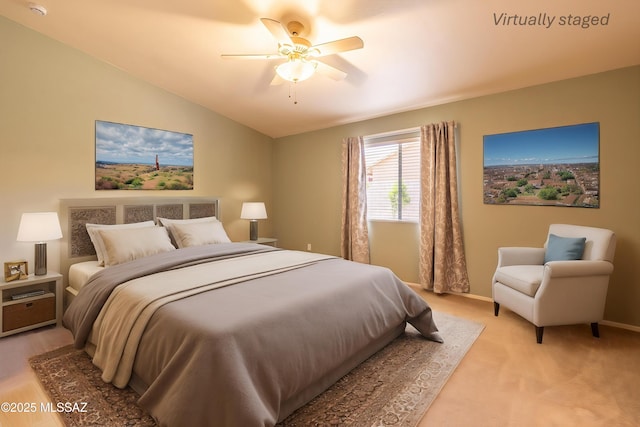 9664 E Paseo, San Rosendo, Tucson, AZ 85747 - bedroom featuring vaulted ceiling, a ceiling fan, light colored carpet, and baseboards