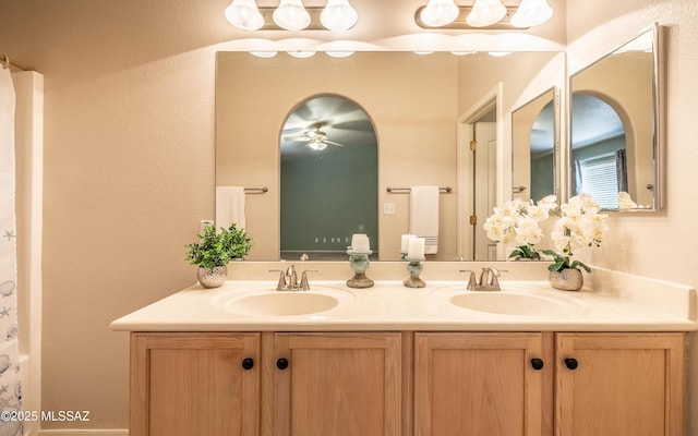 9664 E Paseo, San Rosendo, Tucson, AZ 85747 - full bathroom with double vanity and ceiling fan