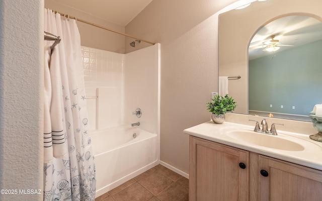 9664 E Paseo, San Rosendo, Tucson, AZ 85747 - bathroom featuring shower / bath combination with curtain, a ceiling fan, vanity, tile patterned flooring, and baseboards