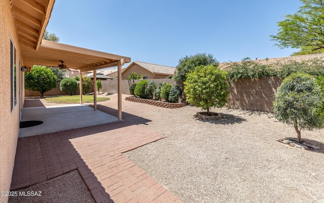 9664 E Paseo, San Rosendo, Tucson, AZ 85747 - fenced backyard featuring ceiling fan and a patio area