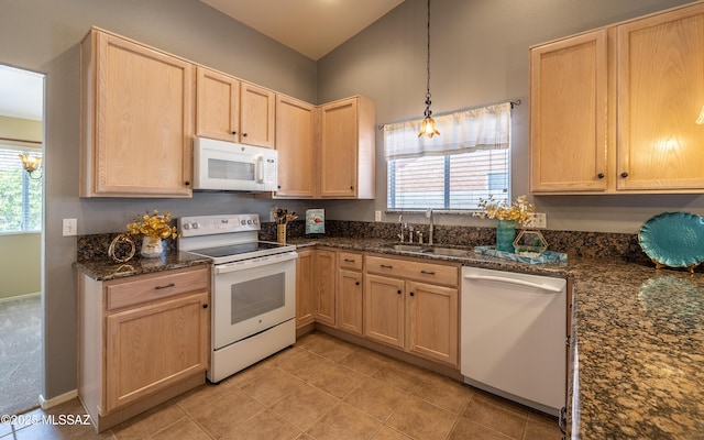 9664 E Paseo, San Rosendo, Tucson, AZ 85747 - kitchen with white appliances, light brown cabinetry, a sink, dark stone countertops, and vaulted ceiling