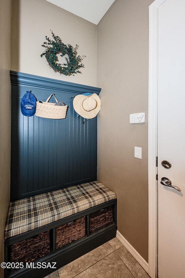 4762 W Placita Casa Sevilla, Marana, AZ 85658 - mudroom with tile patterned floors and baseboards