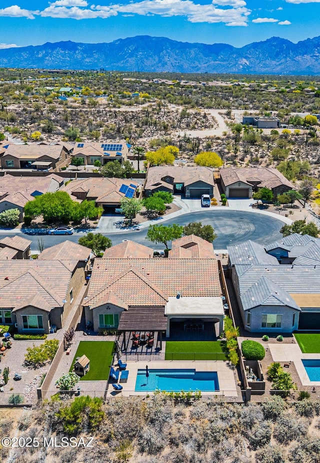 4762 W Placita Casa Sevilla, Marana, AZ 85658 - aerial view of residential area with a mountain backdrop and a pool
