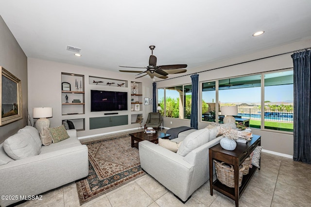 4762 W Placita Casa Sevilla, Marana, AZ 85658 - tiled living area featuring ceiling fan, recessed lighting, and baseboards