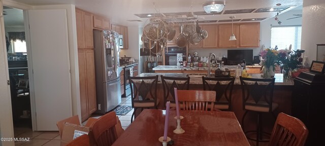 4081 N Hidden Cove Pl, Tucson, AZ 85749 - dining area featuring light tile patterned floors