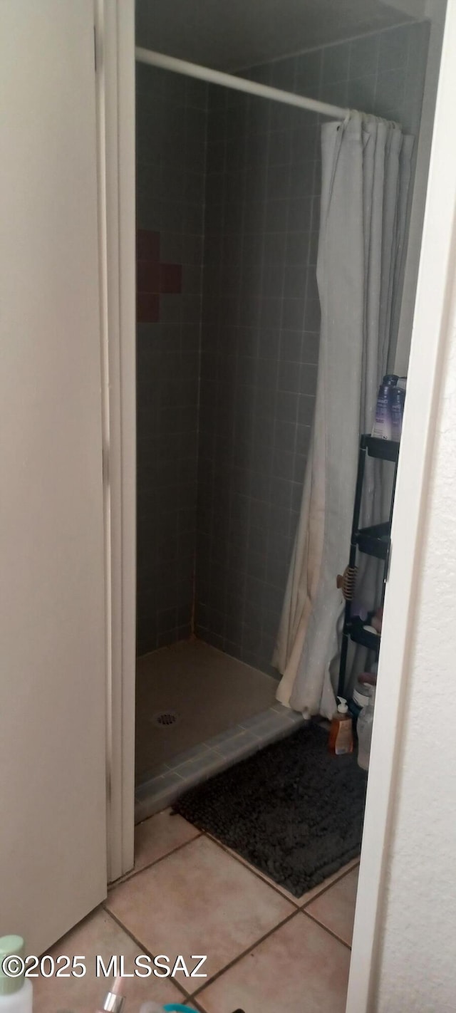 4081 N Hidden Cove Pl, Tucson, AZ 85749 - bathroom featuring a stall shower and tile patterned floors